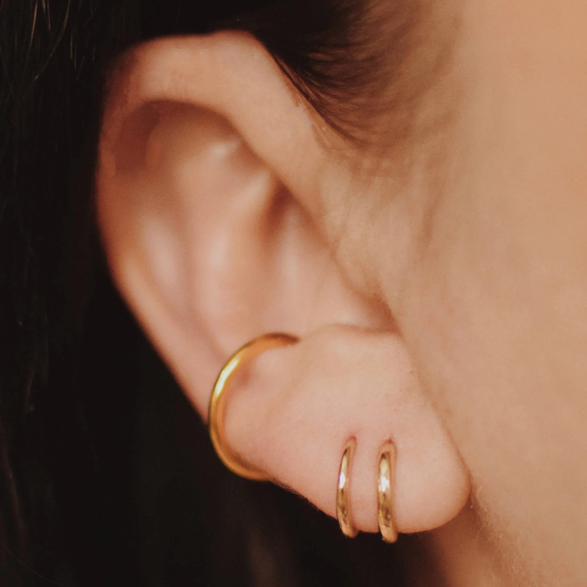 Classic Huggie Hoops in 14k Gold - Image 2